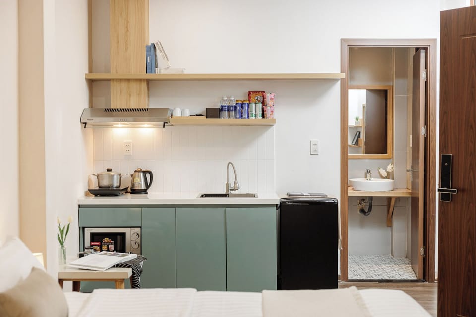 Deluxe Quadruple Room, Kitchenette | Private kitchen | Mini-fridge, electric kettle