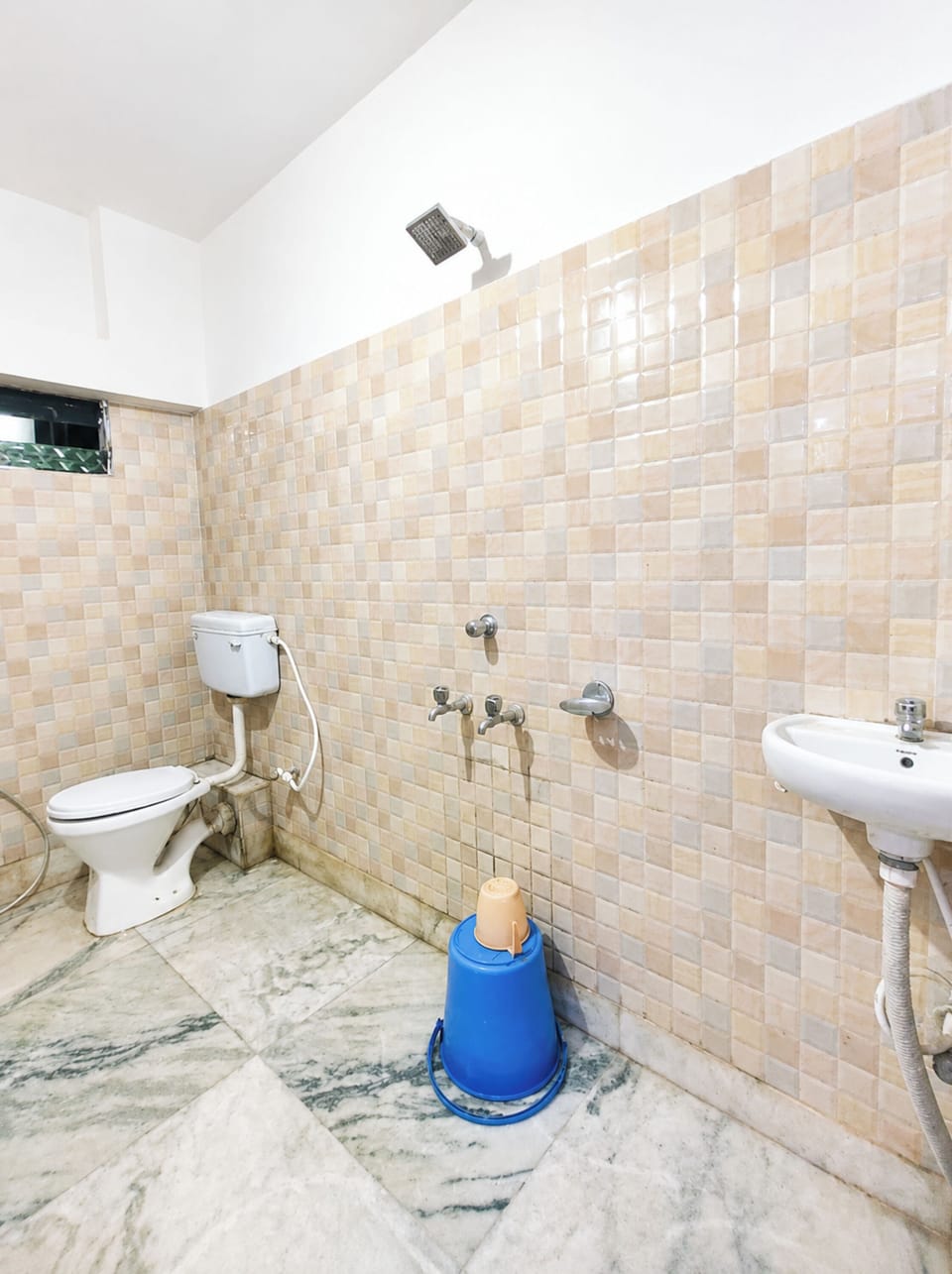 Shower, rainfall showerhead, slippers, towels