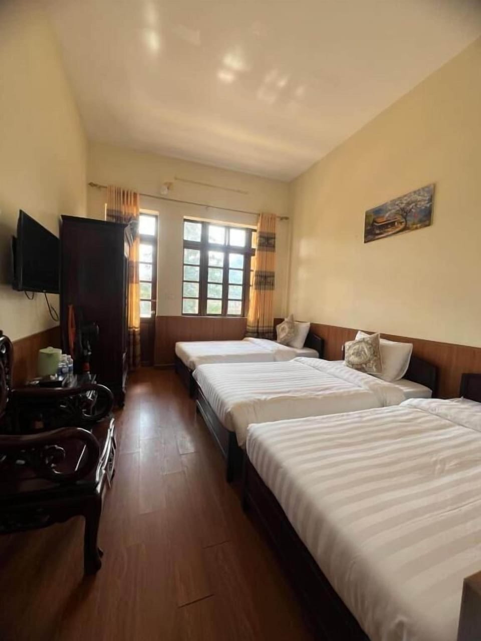 Deluxe Triple Room, Balcony, Garden View | Soundproofing, WiFi (free)