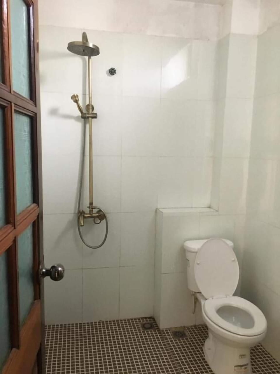 Shower, hair dryer, slippers, towels