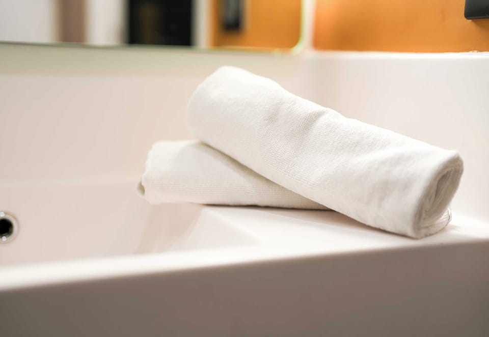 Shower, towels, soap, shampoo