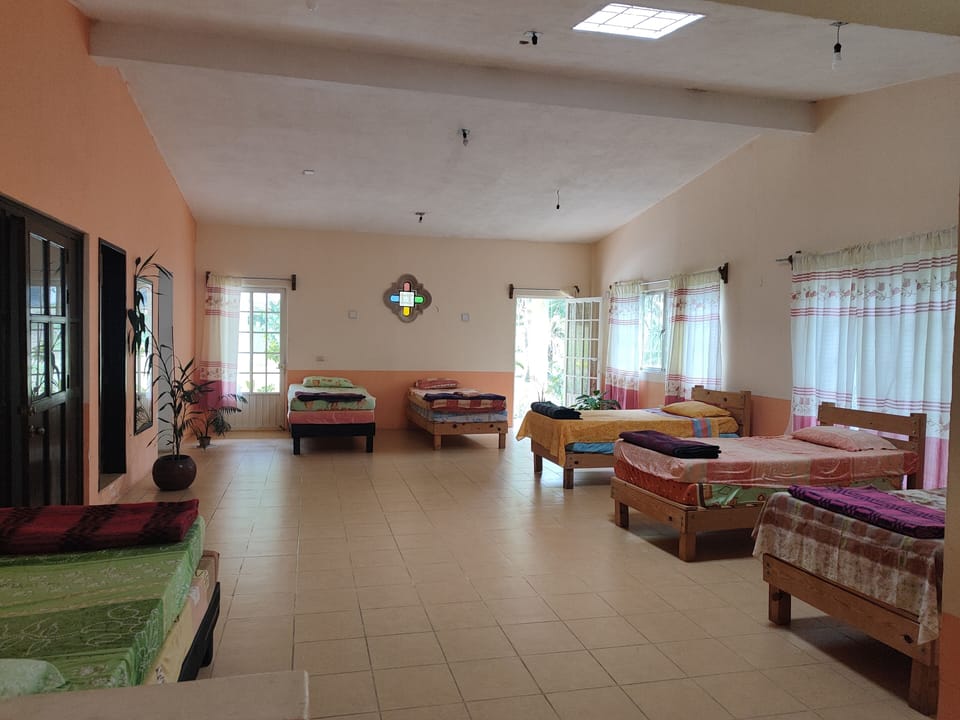 Family Shared Dormitory, Garden View | Desk, laptop workspace, WiFi (free), individually decorated