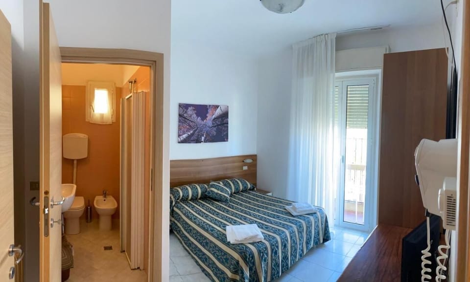 Desk, blackout drapes, iron/ironing board, WiFi (free)