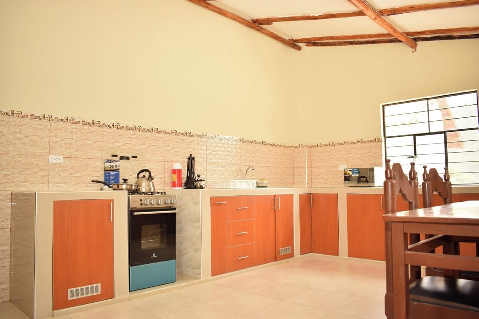 Family Apartment, Patio, Mountain View | Private kitchen