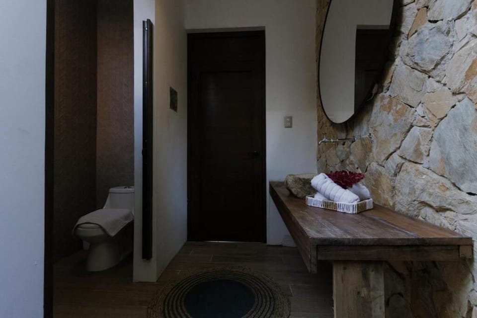Separate tub and shower, towels, soap, shampoo