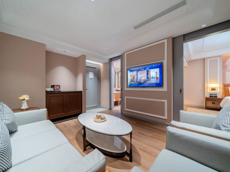 Luxury Suite, City View | Living area | 63-inch LED TV with cable channels, video-game console, first-run movies