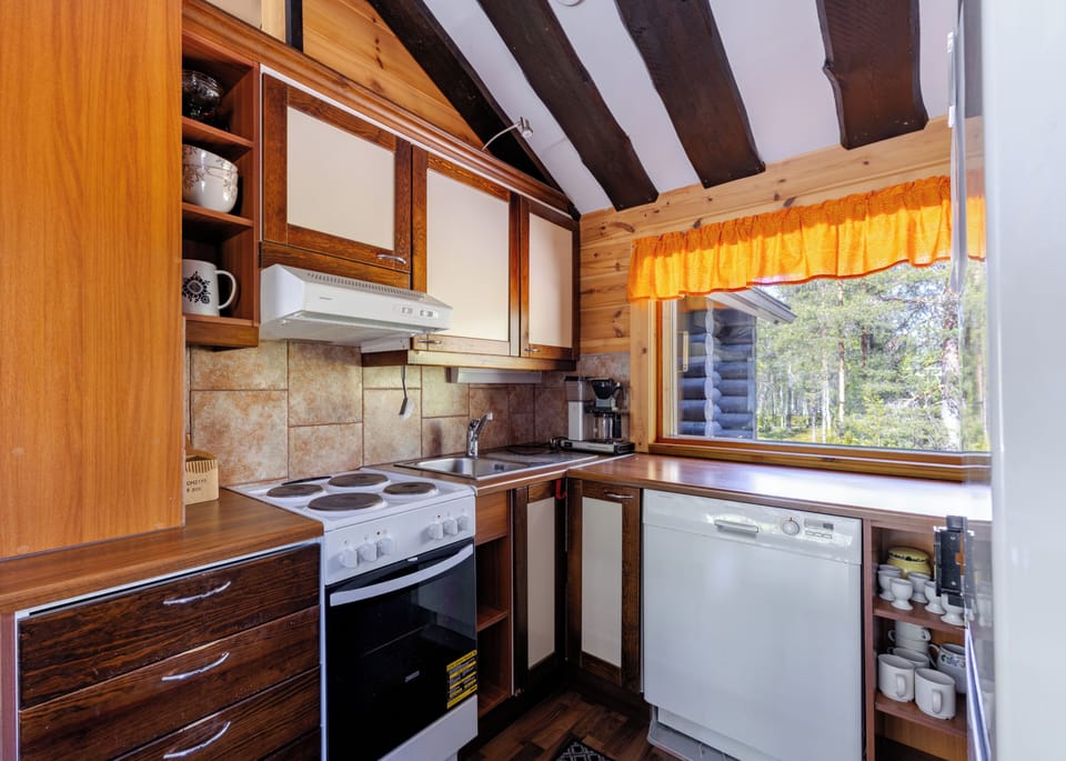 Apartment, Multiple Beds, Sauna, Slope side | Private kitchen | Coffee/tea maker, full-size fridge, microwave, oven