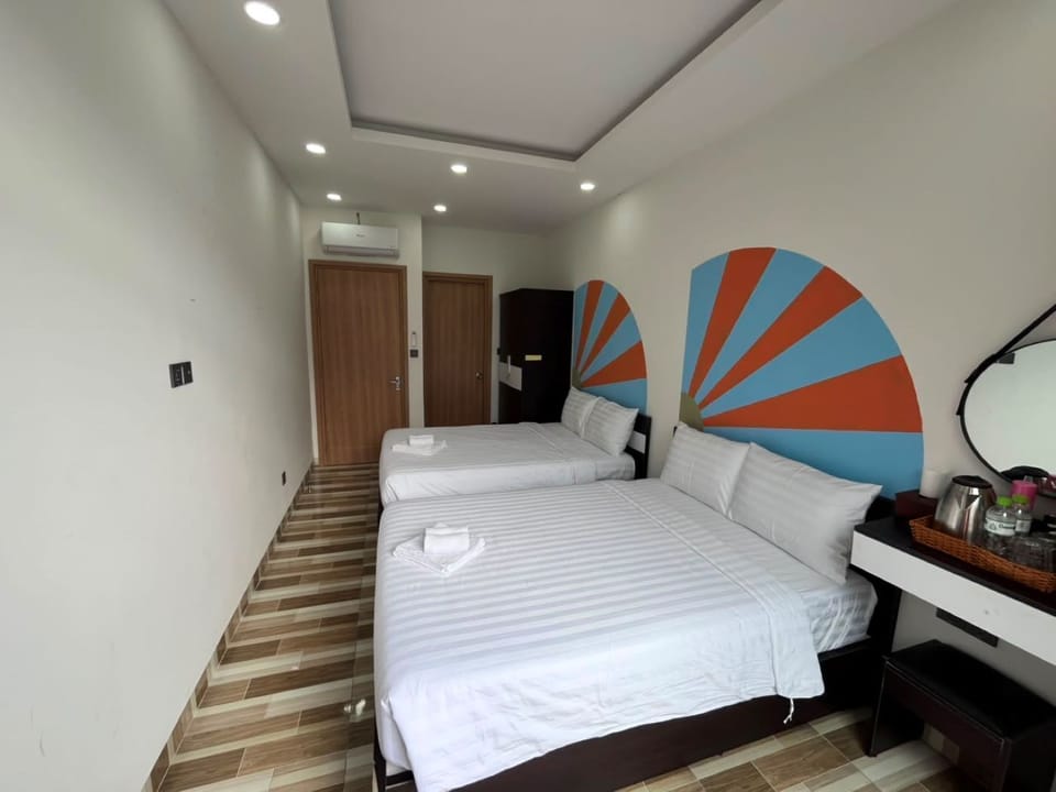Family Room, City View | Down comforters, memory foam beds, WiFi (free), bed sheets
