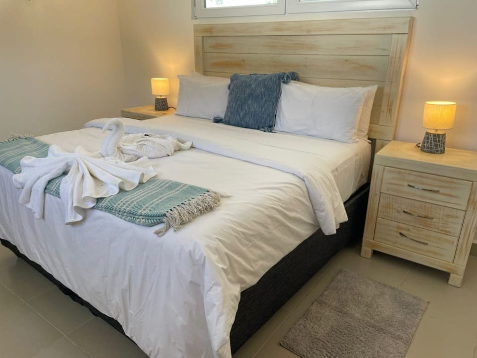 Deluxe Bungalow, Garden View | In-room safe, desk, laptop workspace, iron/ironing board