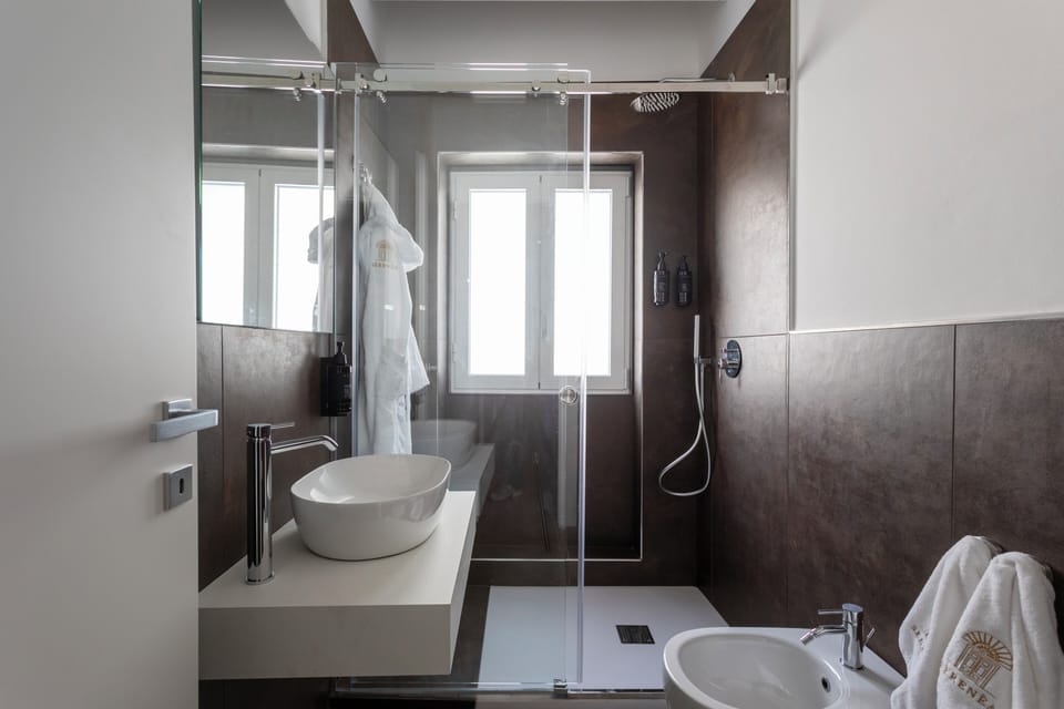 Standard Double Room | Bathroom | Shower, hair dryer, towels, soap