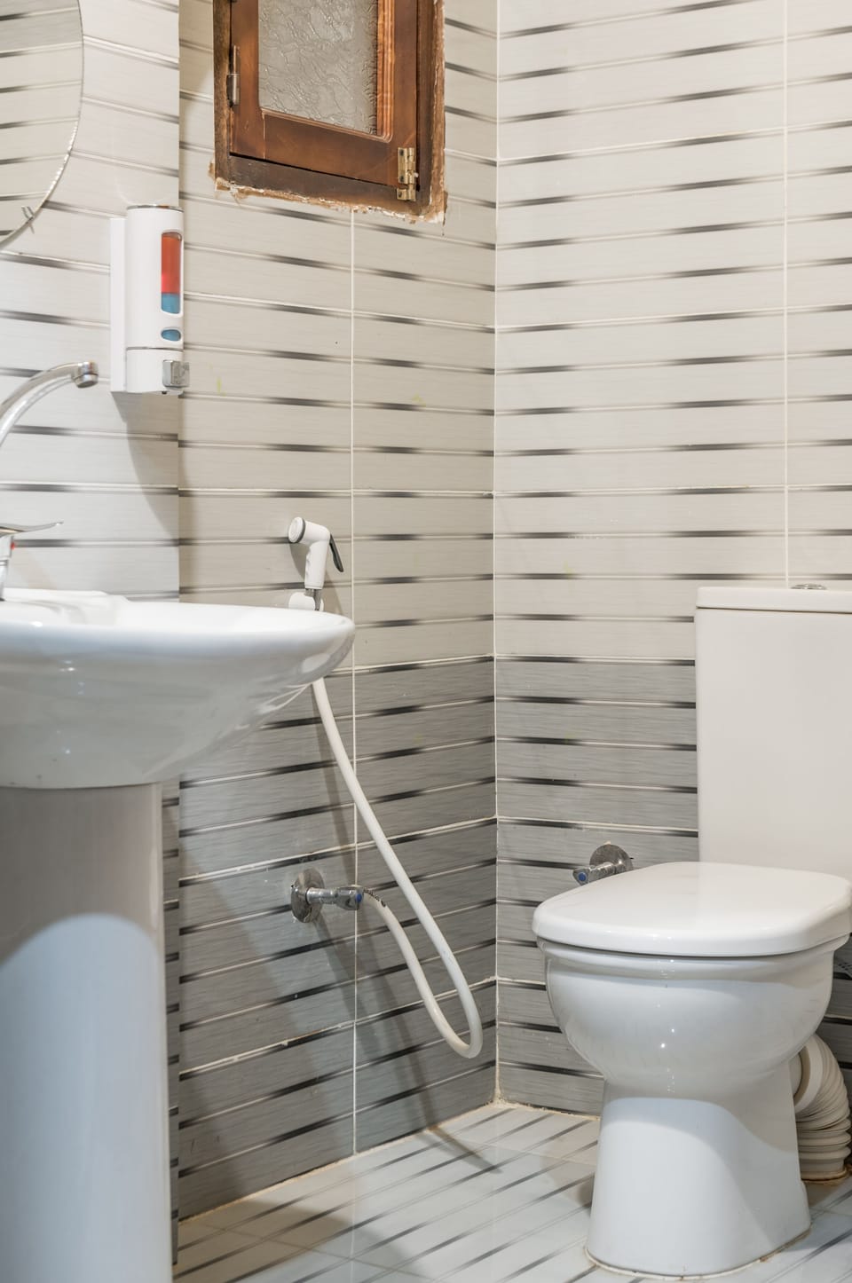 Basic Triple Room | Bathroom | Shower, bidet, towels, soap