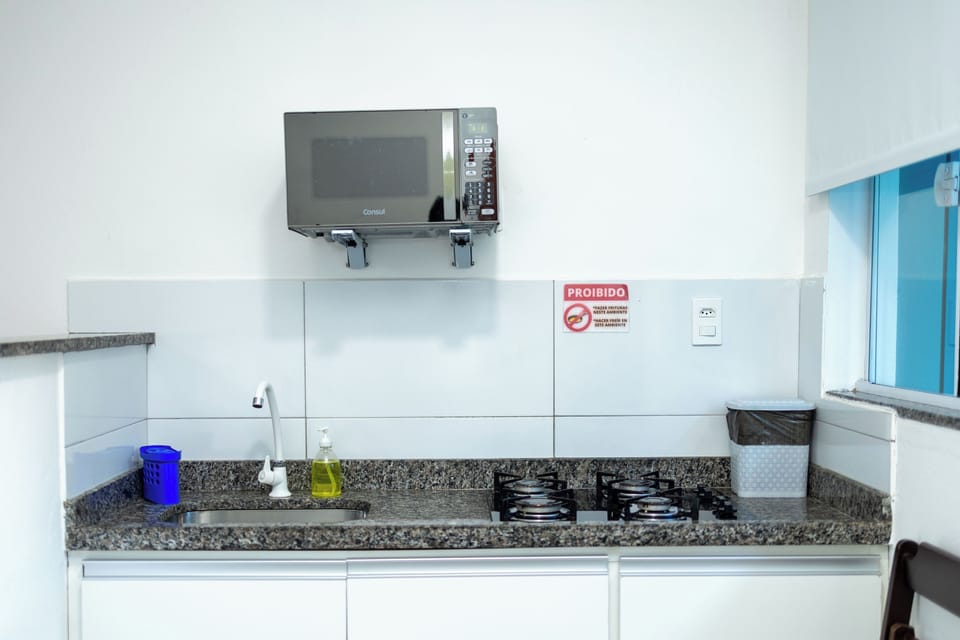 Triple Room | Private kitchen | Mini-fridge, microwave, stovetop, cookware/dishes/utensils