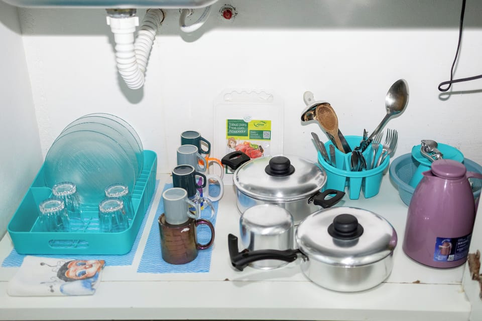 Mini-fridge, microwave, stovetop, cookware/dishes/utensils
