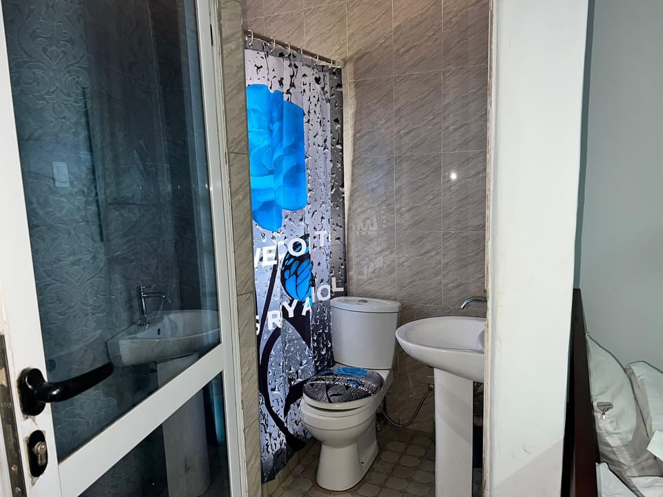Shower, towels, soap, toilet paper