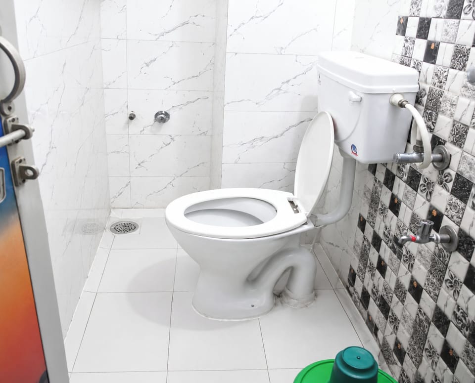 Shower, rainfall showerhead, slippers, towels
