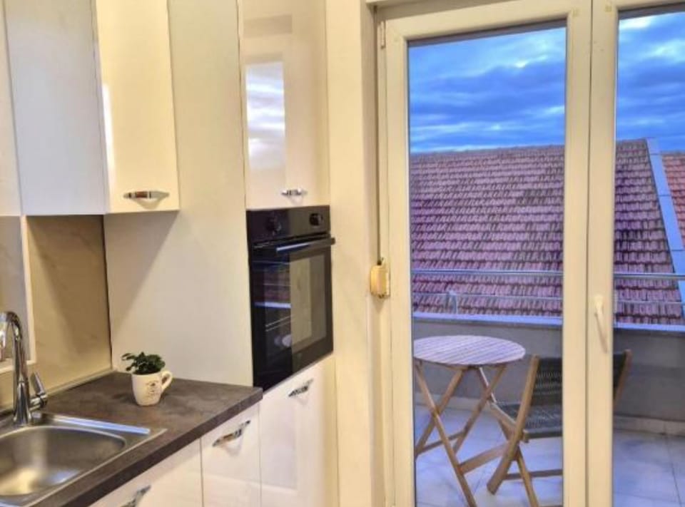 Apartment (Two Bedroom Apartment with Sea View a) | Private kitchen | Fridge