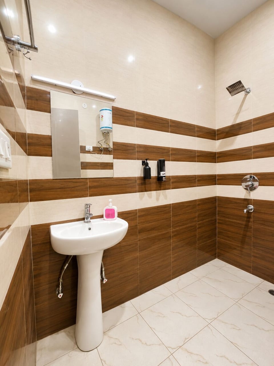 Junior Room | Bathroom | Shower, towels, soap, toilet paper
