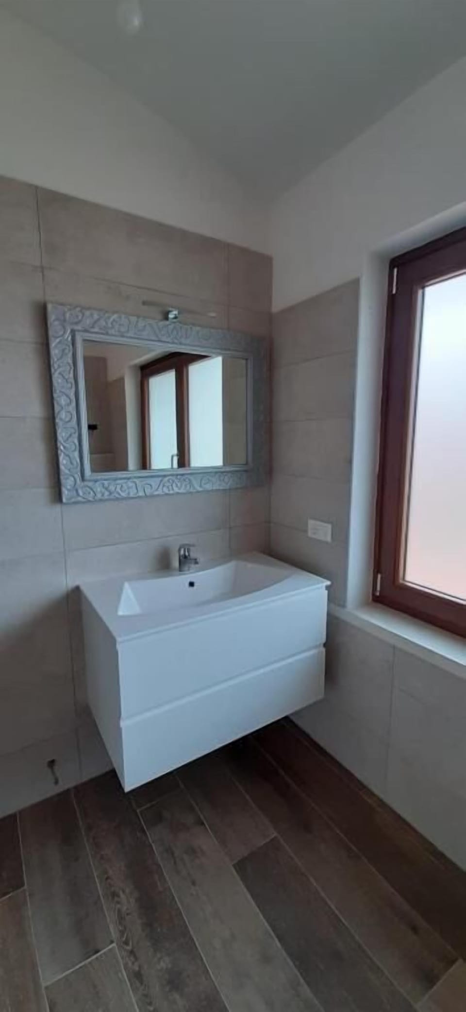 Combined shower/tub, hair dryer, towels, toilet paper