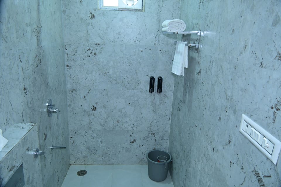 Shower, slippers, towels, soap