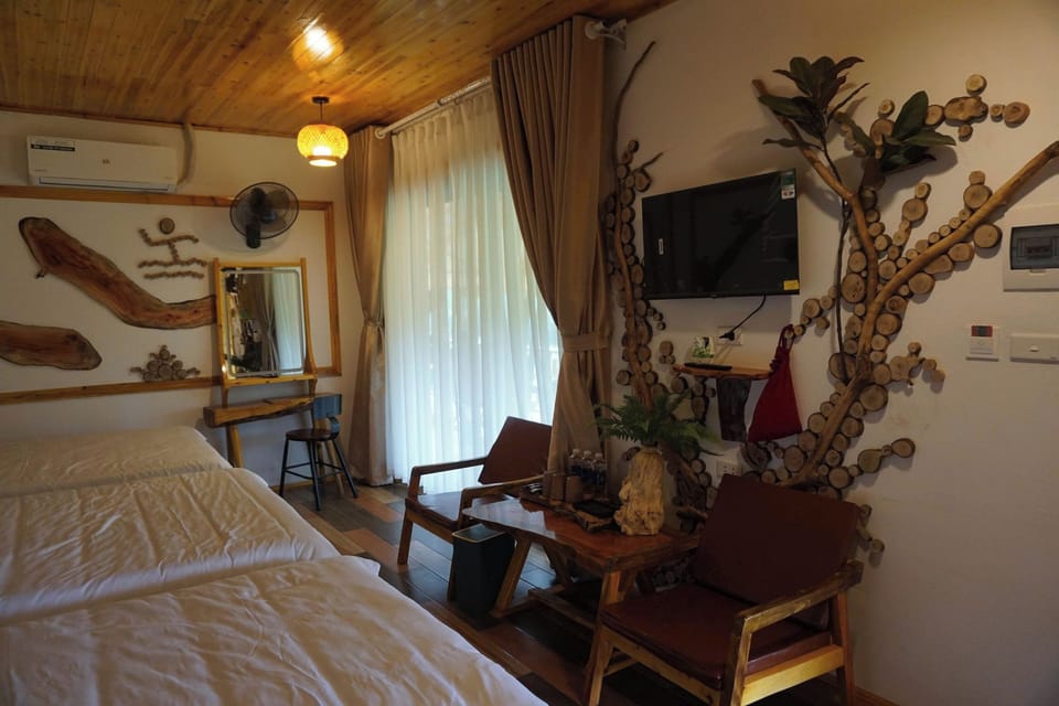 Junior Triple Room, Garden View | In-room safe, blackout drapes, soundproofing