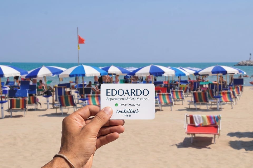 On the beach, sun loungers, beach umbrellas, beach bar
