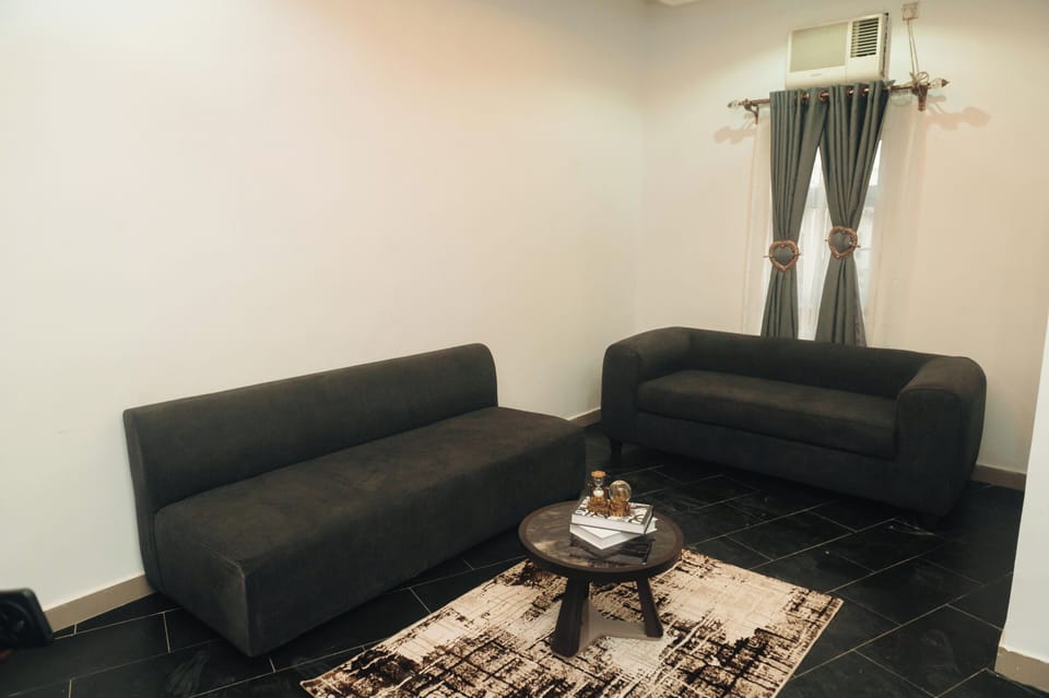 Deluxe Suite | Living area | 42-inch Smart TV with digital channels, Netflix, streaming services