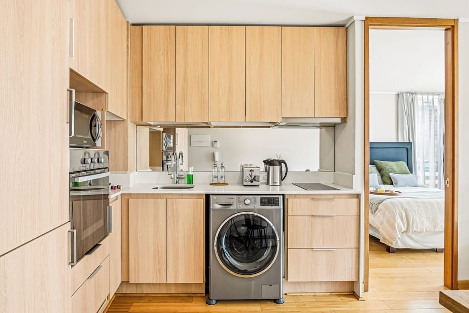 Standard Apartment | Private kitchen | Espresso maker, toaster, highchair, freezer