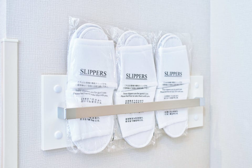 Triple Room, City View | Bathroom amenities | Slippers, bidet