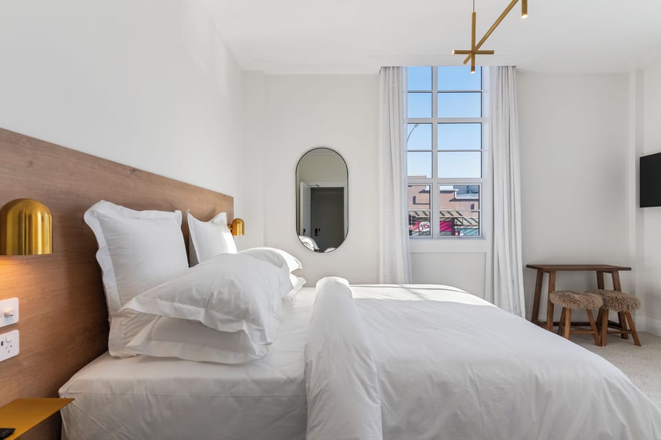 Premium bedding, blackout drapes, soundproofing, iron/ironing board