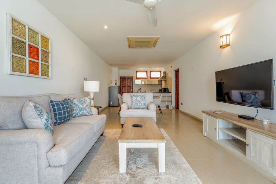 Deluxe Apartment, Sea View | Living area