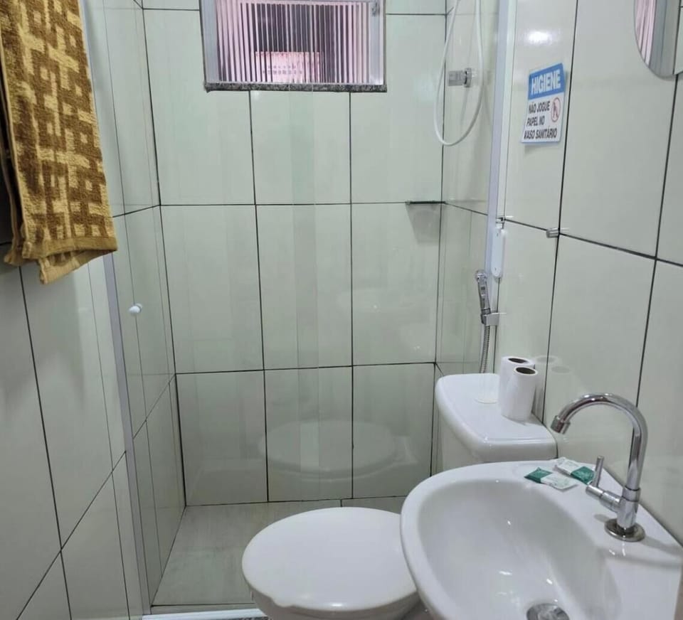 Basic Twin Room | Bathroom | Shower, towels, soap, toilet paper