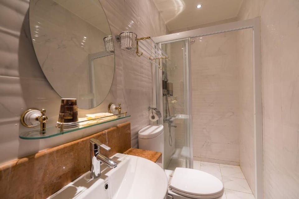 Shower, free toiletries, hair dryer, slippers