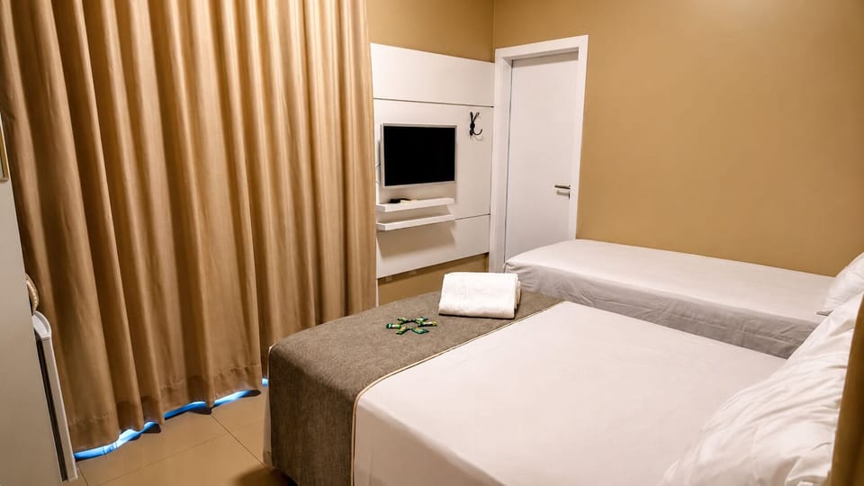 Superior Triple Room, City View | Blackout drapes, WiFi (free), bed sheets