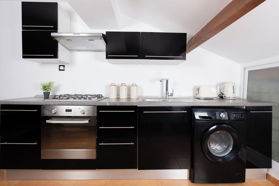 Apartment | Private kitchen | Fridge, stovetop, cookware/dishes/utensils