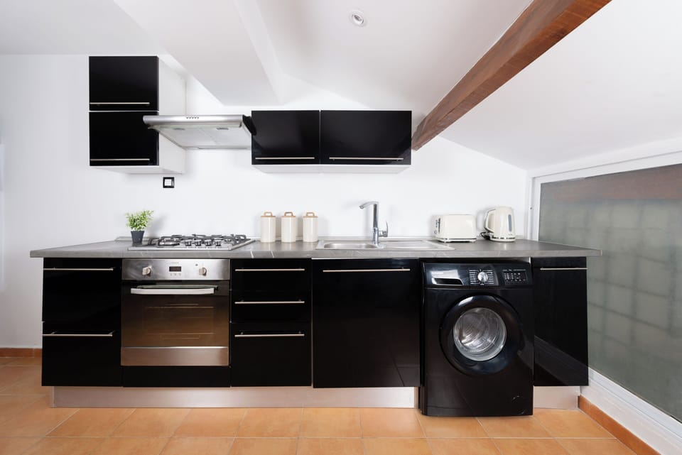 Apartment | Private kitchen | Fridge, stovetop, cookware/dishes/utensils