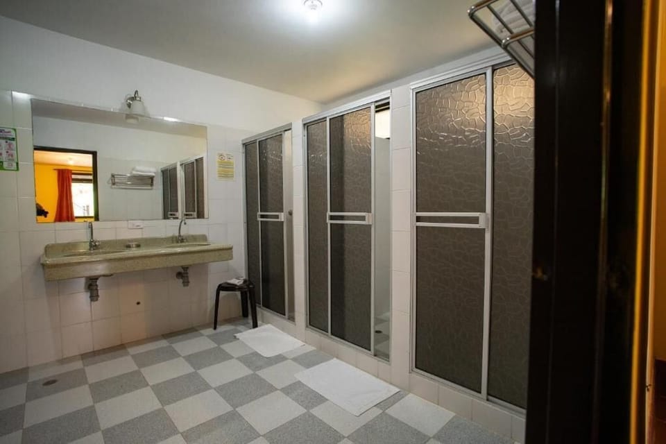 Triple Room, Garden View | Bathroom | Shower, towels, soap, shampoo
