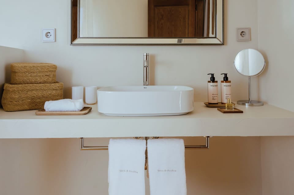 Superior Double Room, Balcony, Mountain View | Bathroom | Separate tub and shower, rainfall showerhead, hair dryer, slippers
