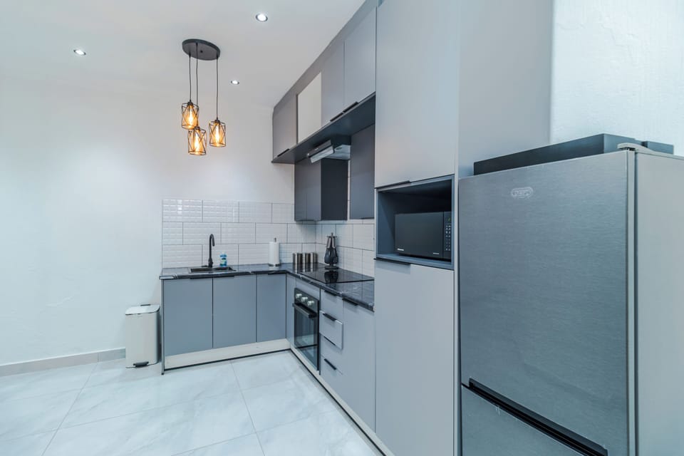 Mini-fridge, microwave, coffee grinder, mixer