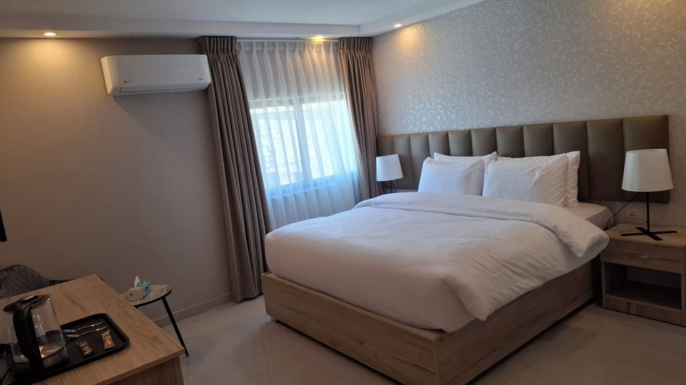 Basic Double Room | Hypo-allergenic bedding available, pillowtop beds, in-room safe, desk