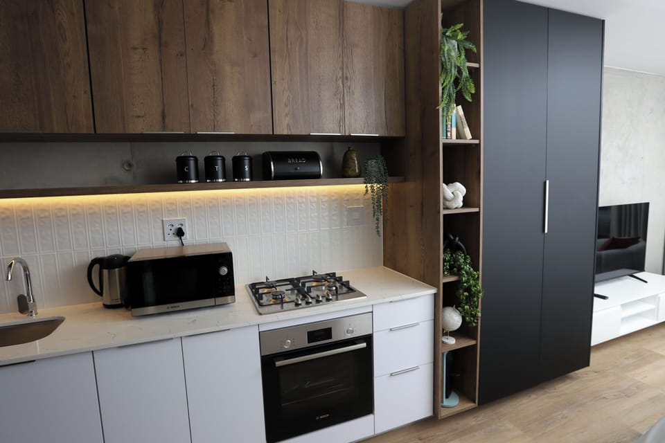 Family Apartment, Balcony | Private kitchen | Full-size fridge, microwave, oven, stovetop