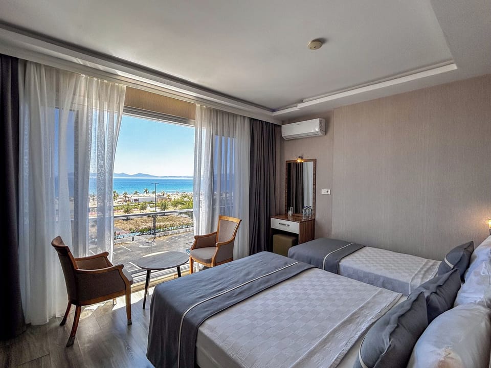 Standard Triple Room, Sea View | In-room safe, WiFi (free)