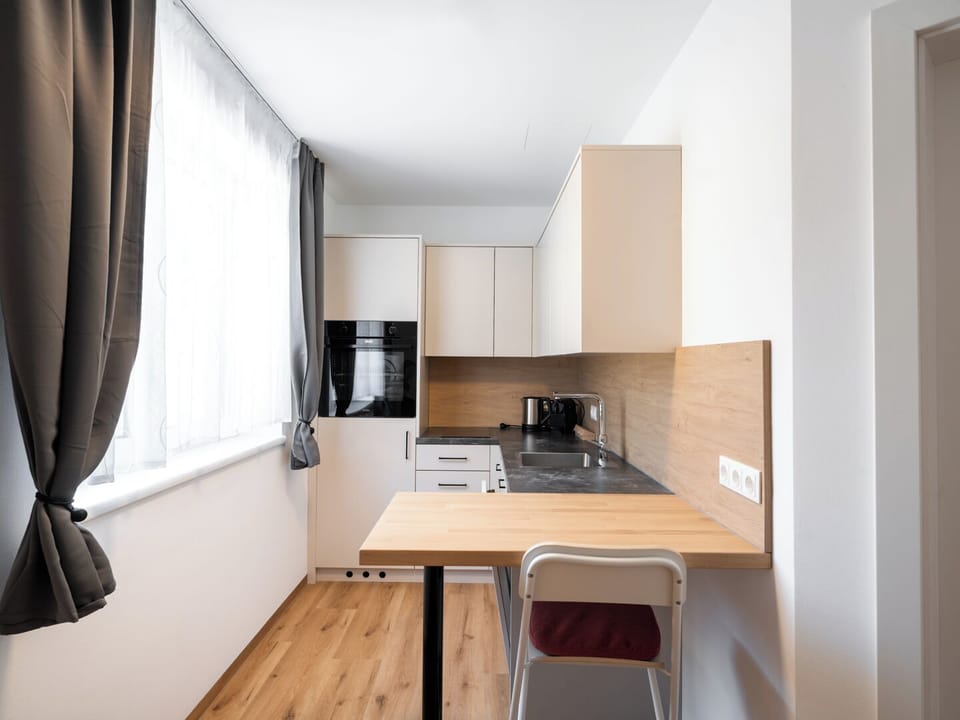 Deluxe Condo, Balcony, Mountain View | Private kitchen | Fridge, stovetop, cookware/dishes/utensils