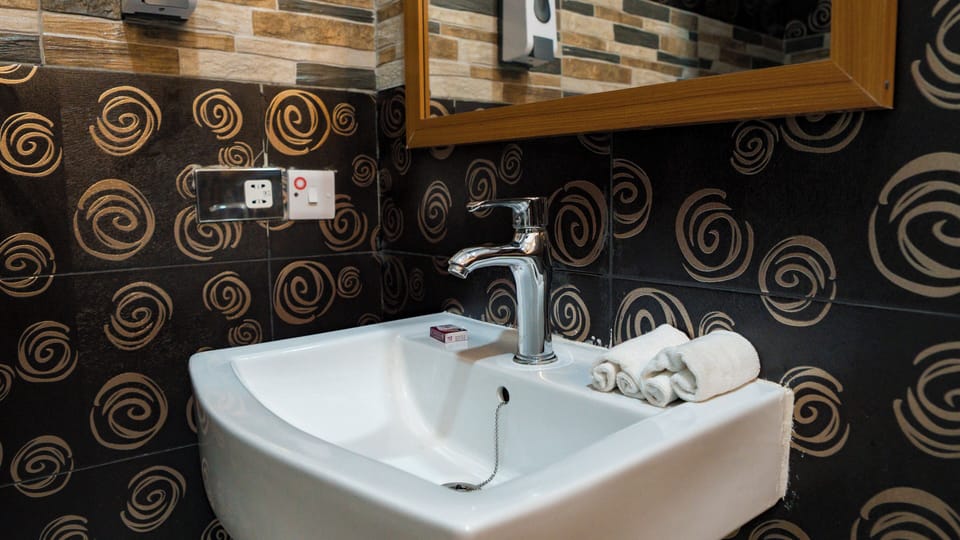Family Quadruple Room, Pool View | Bathroom | Shower, free toiletries, towels, soap