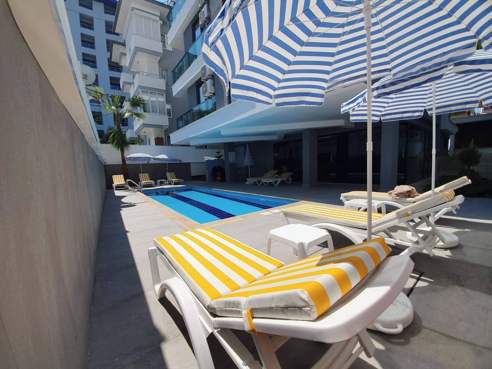 Apartment, 1 Bedroom, Balcony | Pool | Outdoor pool