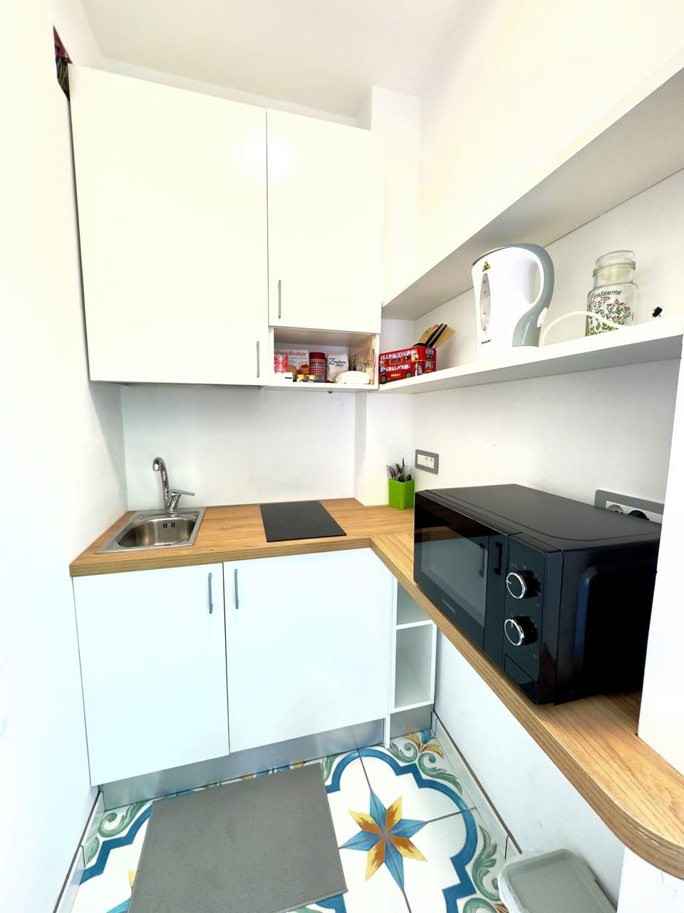 Comfort Apartment, Balcony, Bay View | Private kitchen | Espresso maker, coffee/tea maker, full-size fridge, microwave