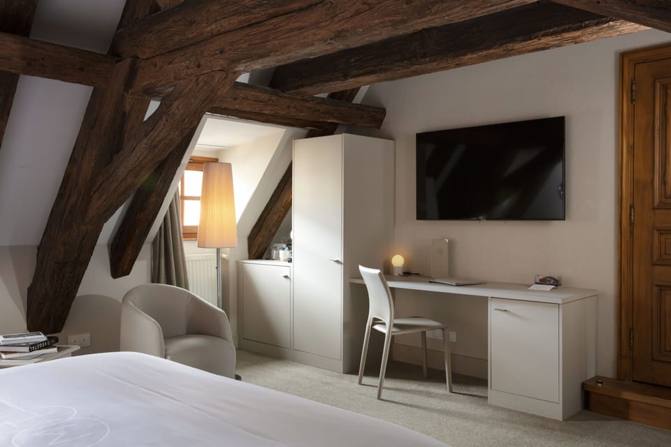 Caractère Room | Premium bedding, minibar, in-room safe, individually decorated