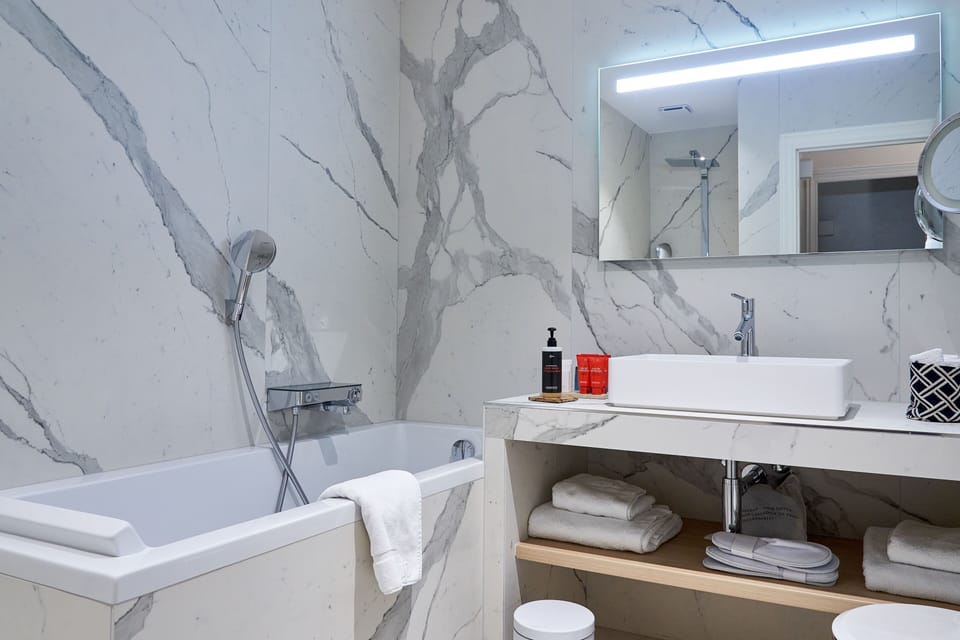 Caractère Room | Bathroom | Free toiletries, hair dryer, bathrobes, slippers