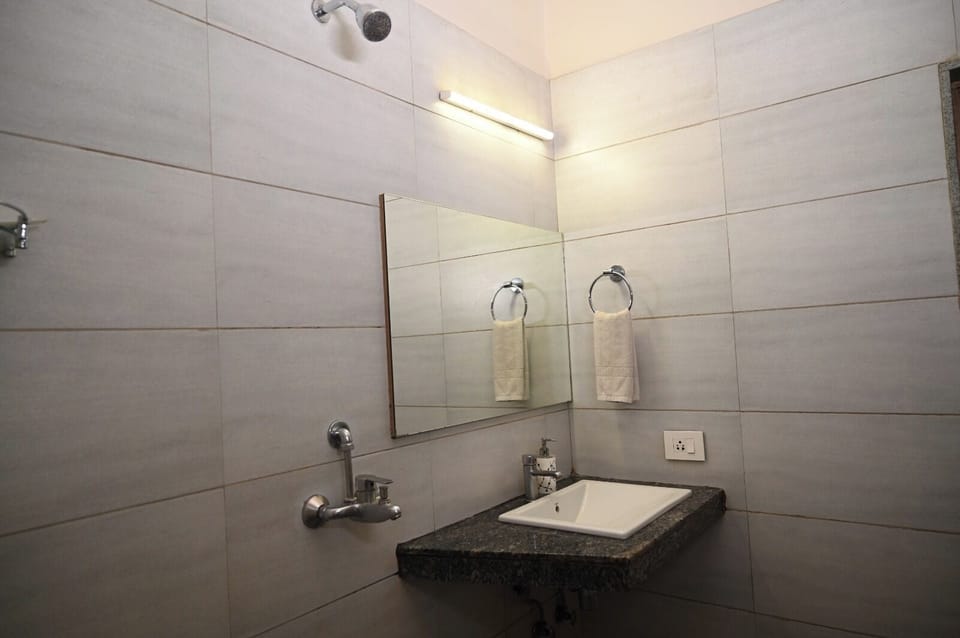 Shower, towels, soap, shampoo