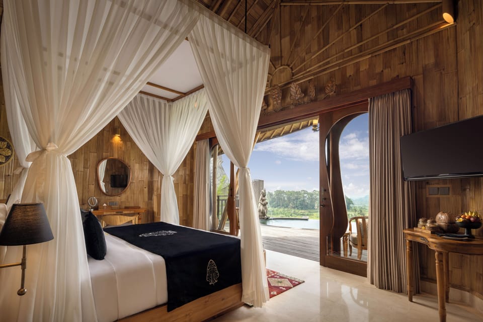 Premiere Pool Villa | In-room safe, desk, laptop workspace, blackout drapes