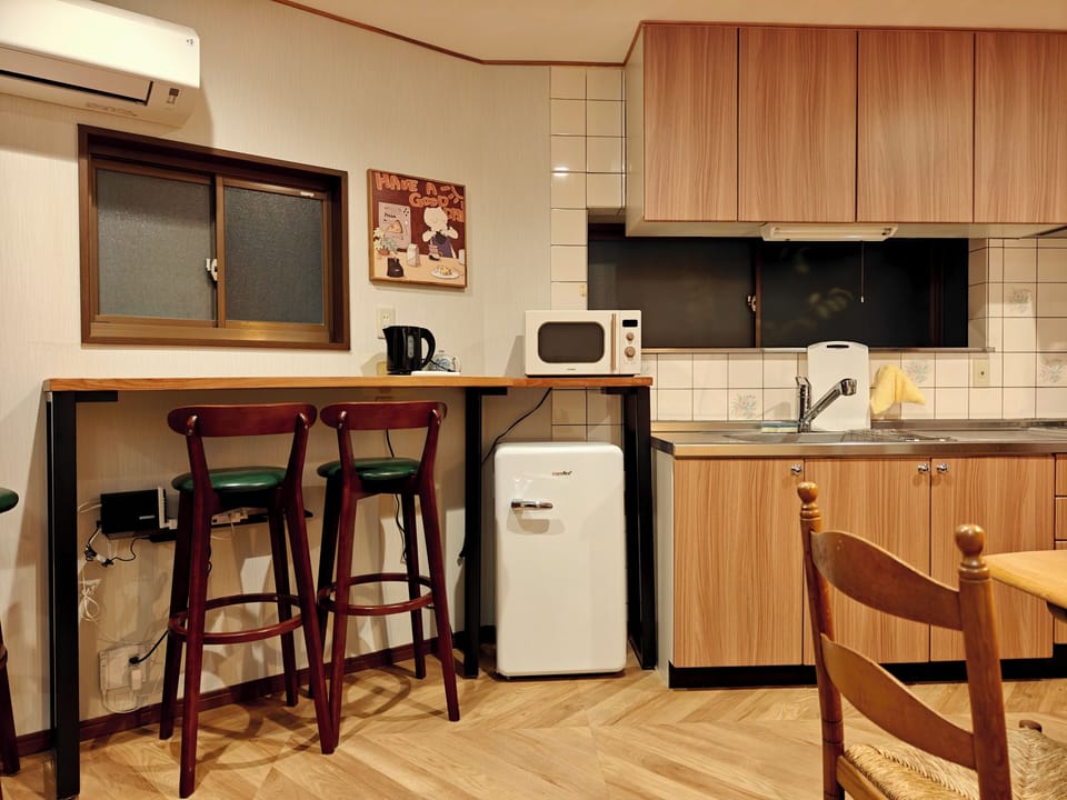 Family Villa, 4 Bedrooms, Balcony | Private kitchen | Shared fridge, shared microwave
